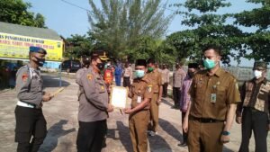 Kapolres Batubara Beri Reward Muspika, Tomas dan Santunan Anak Yatim