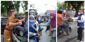 Ketua TP PKK Bersama Wabup Labura Bagi Takjil di Jalan