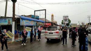 DPC Pendawa Kolaborasi Polres dan RE Bagi Masker di Jalinsum Batubara