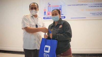 Bupati Batubara Bersama 141 Kades Sosialisasi dan Menandatangani Komitmen Taat Pajak