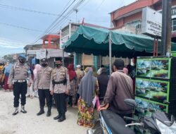 Polisi Kawal Penyaluran BST BPNT di Kantor Pos Tanjung Tiram