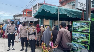 Polisi Kawal Penyaluran BST BPNT di Kantor Pos Tanjung Tiram