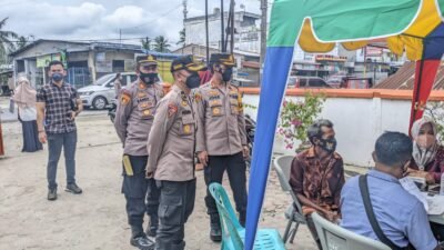 Kapolres Batubara Cek Penyalurkan BPNT dan Vaksinasi di Medang Deras
