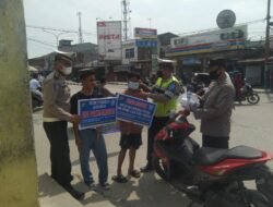 Lantas Polres Batubara Bagi Masker dan Himbau Pengendara Taat Lalu Lintas