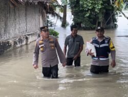 Polsek Lima Puluh Cek Luapan Air Sungai Nibung dan Berikan Bantuan