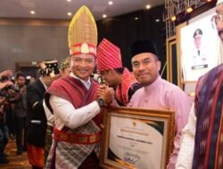 Di Musrenbang RKPD 2025,Pemkab Labura Terima Penghargaan