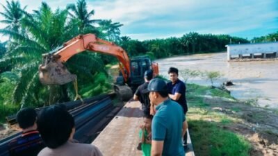 Perbaikan Tanggul Sungai Dalu-Dalu Batubara Dimulai