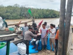 Polsek Medang Deras Beri Nasi ke Nelayan