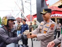 Polres Tebing Tinggi dan GP Ansor Bagikan 250 Bungkus Nasi ke Warga Kurang Mampu