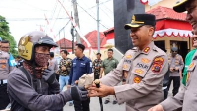 Polres Tebing Tinggi dan GP Ansor Bagikan 250 Bungkus Nasi ke Warga Kurang Mampu