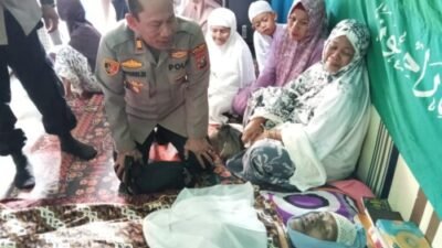 Kapolsek Talawi Antar Santunan Untuk Keluarga Wartawan Meninggal