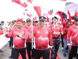 Bupati Asahan Kibarkan Bendera Merah Putih Raksasa di Muara Selat Malaka
