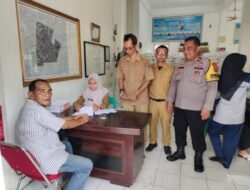 Polsek Padang Hilir Monitoring Pembagian Bantuan Pangan di Kelurahan Rambung